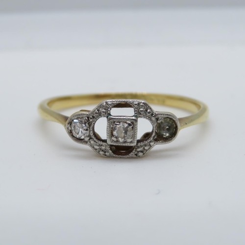 129 - 18ct and diamond (with spare diamond) ring 1.6g