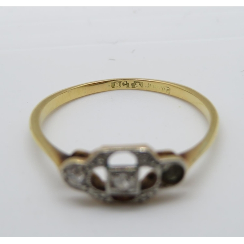 129 - 18ct and diamond (with spare diamond) ring 1.6g