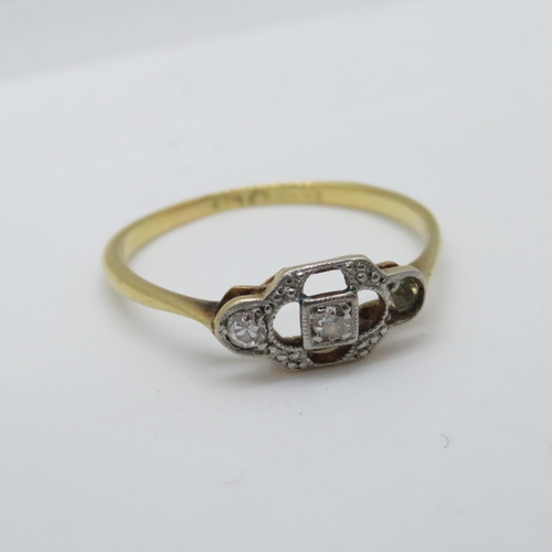 129 - 18ct and diamond (with spare diamond) ring 1.6g