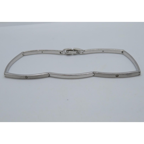 13 - Modern silver bracelet set with 4x small diamonds 7.5