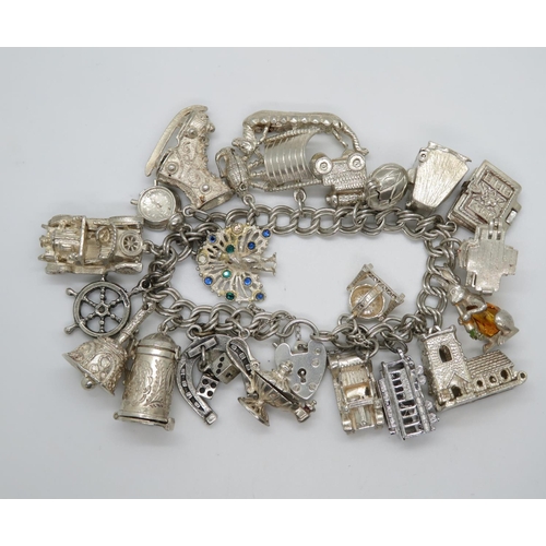 26 - George Jensen silver bracelet set with unusual rare charms stamped GJ Ltd on lock and bracelet only ... 