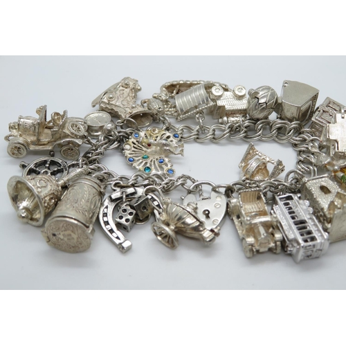 26 - George Jensen silver bracelet set with unusual rare charms stamped GJ Ltd on lock and bracelet only ... 