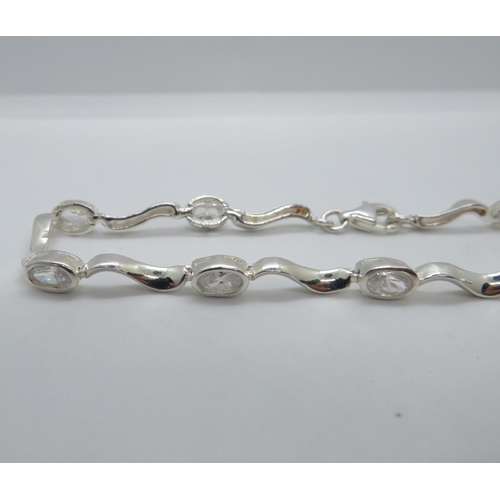 30 - Silver bracelet set with oval CZ stones 7.5