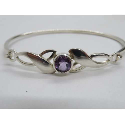 67 - Silver Celtic design bracelet set with amethyst 11g