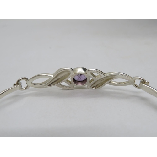 67 - Silver Celtic design bracelet set with amethyst 11g