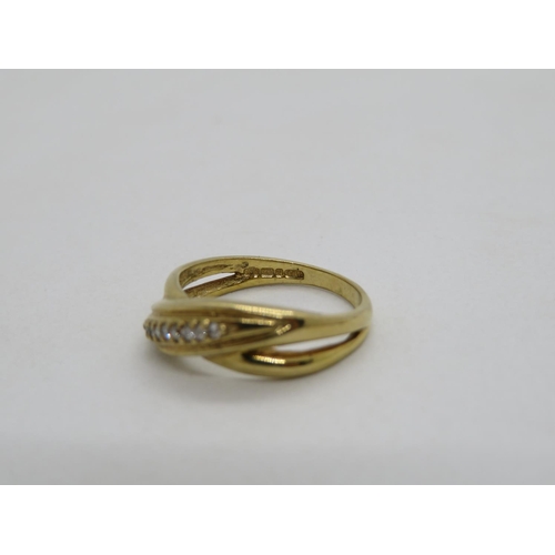 81 - HM 9ct gold and diamond crossover ring 2.9g size L