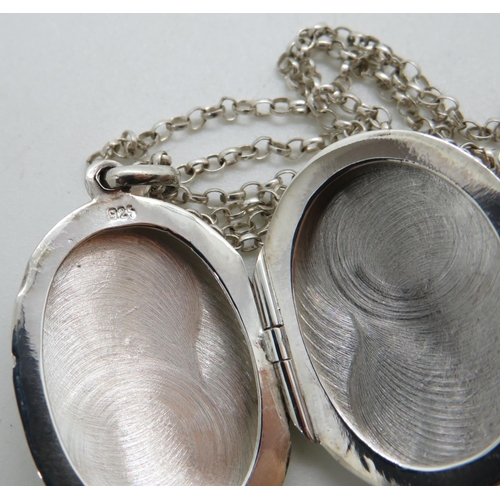 105 - Silver locket engraved both side on 20