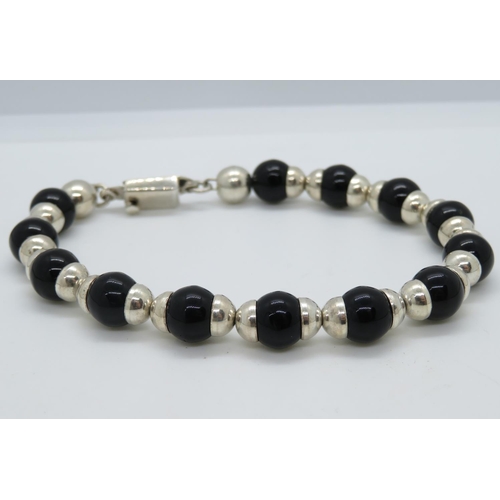 106 - Silver bracelet with black onyx 7.5