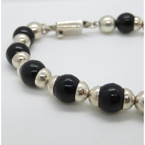 106 - Silver bracelet with black onyx 7.5