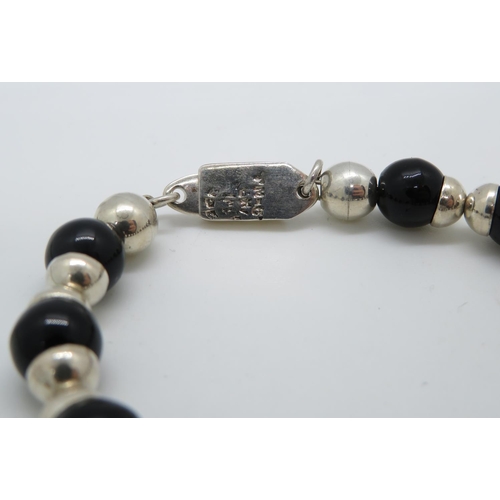 106 - Silver bracelet with black onyx 7.5