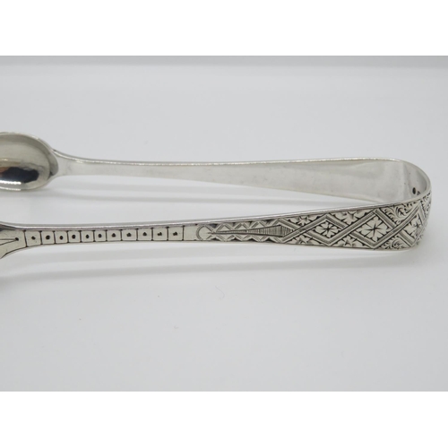 111 - Marshal and Sons George St Edinburgh sugar Tongs 1877HM bright cut pattern 40.7g