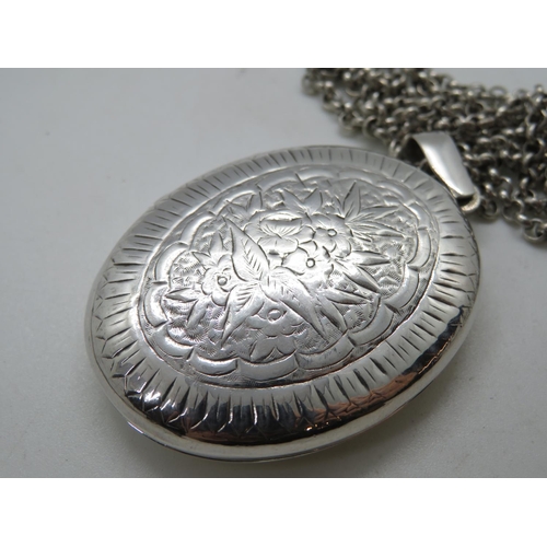 118 - Vintage silver locket on 24