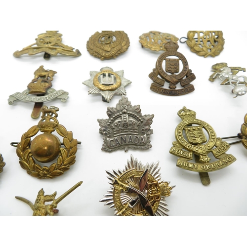 249 - Military cap badges 161g