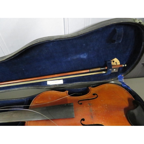 284 - Vintage violin in case with bow
36cm by 21cm