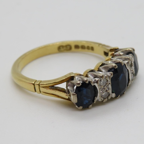 340 - 18ct sapphire and diamond ring size N