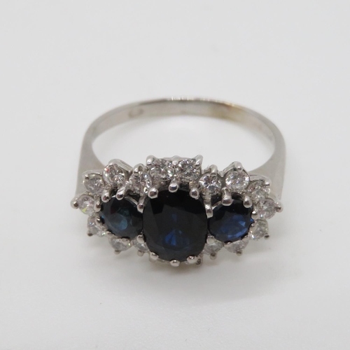 352 - Very nice quality18ct sapphire and diamond cluster ring size T