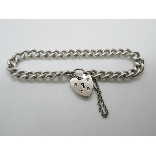 84 - Vintage silver curb link bracelet each link with lion passant Birmingham 1973 22.5g