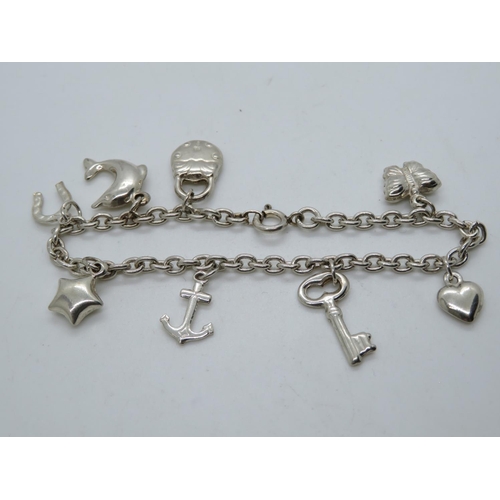 85 - Novelty child's silver charm bracelet 6.75