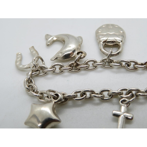 85 - Novelty child's silver charm bracelet 6.75