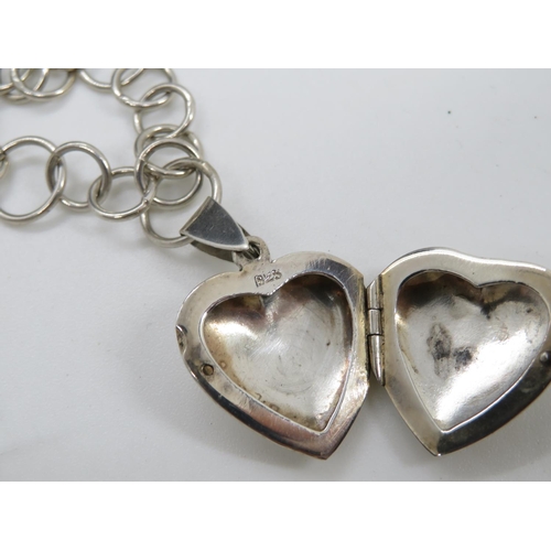 87 - Silver heart locket on 17