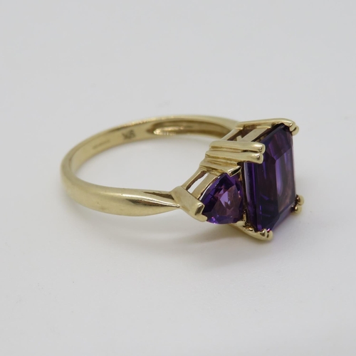 91 - 9ct gold ring set with amethyst stones fully HM size N 3g