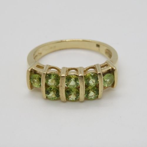 93 - 9ct gold dress ring with peridot fully HM size N 3.6g