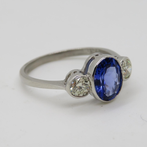 94 - Platinum 3x stone ring with centre Tanzanite 1.3ct and 2x natural brilliant cut diamonds .42ct size ... 