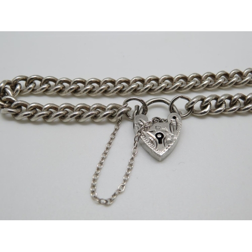 96 - Vintage silver bracelet with engraved lock and chain London 1965 7.25