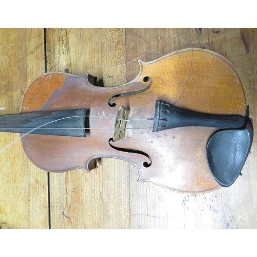 282 - Vintage violin with sarcophagus case
35cm by 20cm