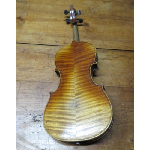 283 - 3/4 violin in wooden sarcophagus case
33cm by 19cm