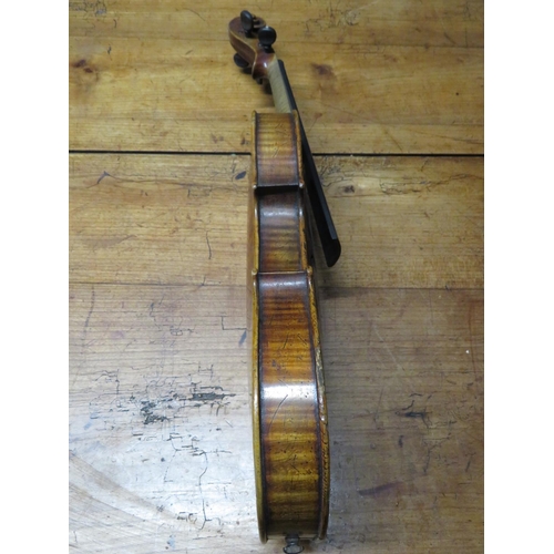 283 - 3/4 violin in wooden sarcophagus case
33cm by 19cm