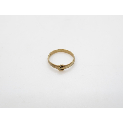 17 - Early 9ct gold child's buckle ring .8g size F