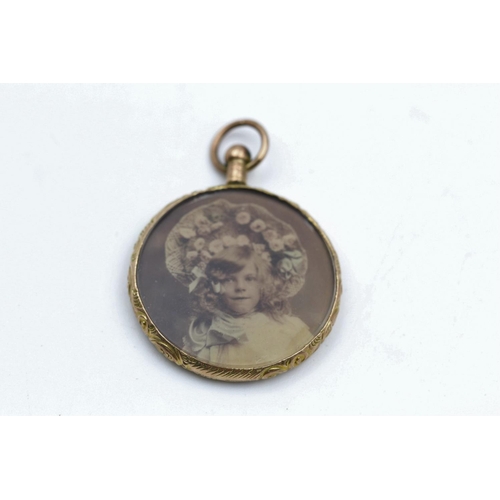 110 - 9ct gold antique photo mourning locket