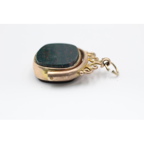 112 - 9ct gold antique gemstone swivel fob with bloodstone & carnelian