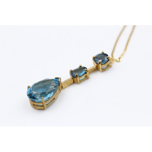 137 - 9ct gold topaz drop pendant necklace