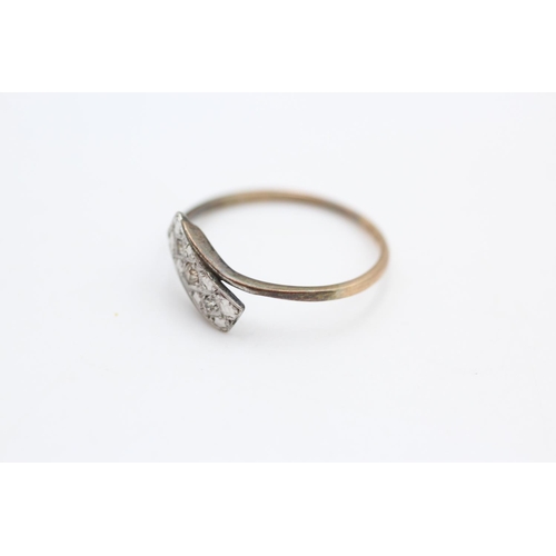 143 - 9ct gold antique diamond twist ring Size R