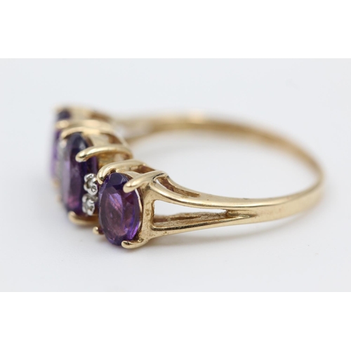 145 - 9ct gold amethyst trilogy ring w/ diamond detail size L