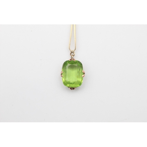 178 - 9ct stone set stylised pendant necklace