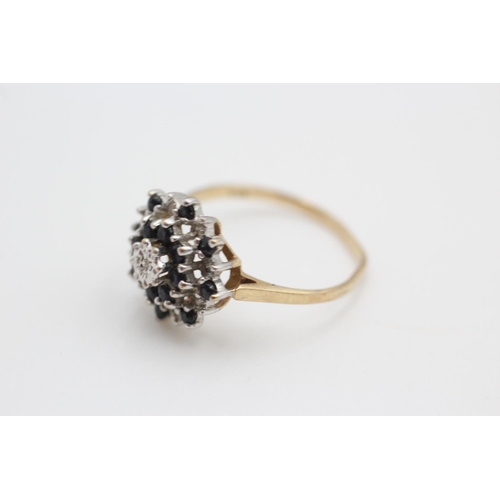 191 - 9ct gold diamond and sapphire cluster ring size R