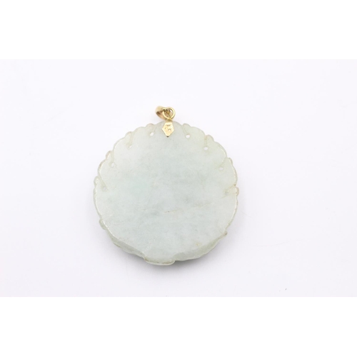 201 - 14ct gold carved jade buddha pendant