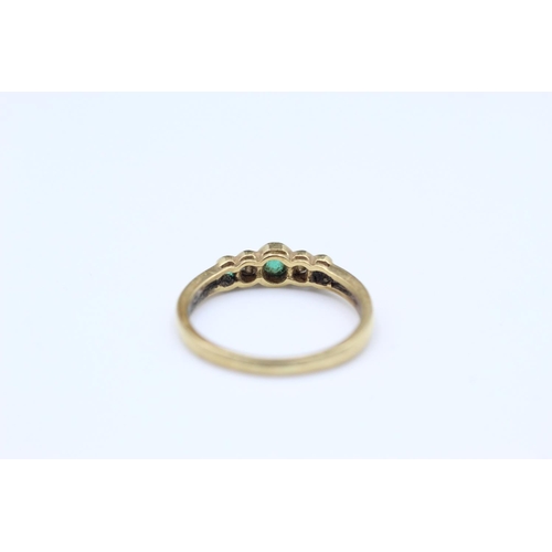 204 - 18ct Gold emerald & diamond five stone ring size P