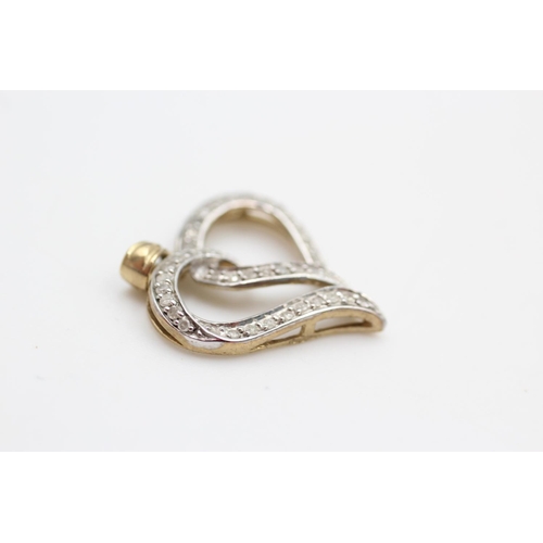 233 - 9ct gold diamond heart pendant