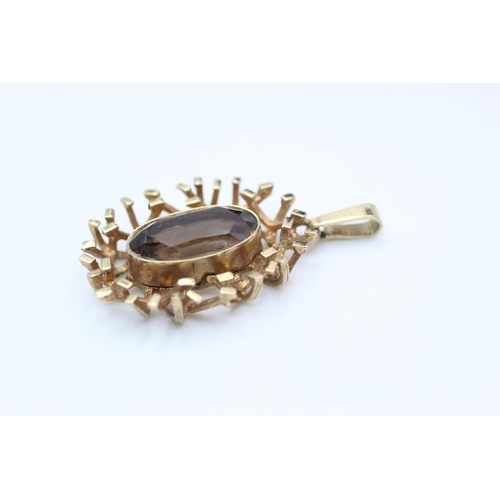 234 - 9ct Gold brutalist design pendant with smoky quartz