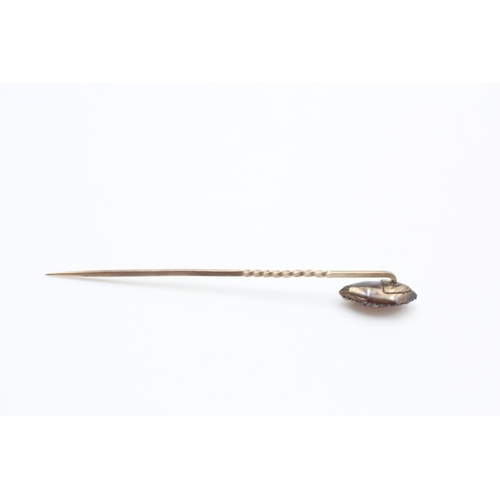 235 - 9ct gold antique foil backed glass & seed pearl stick pin