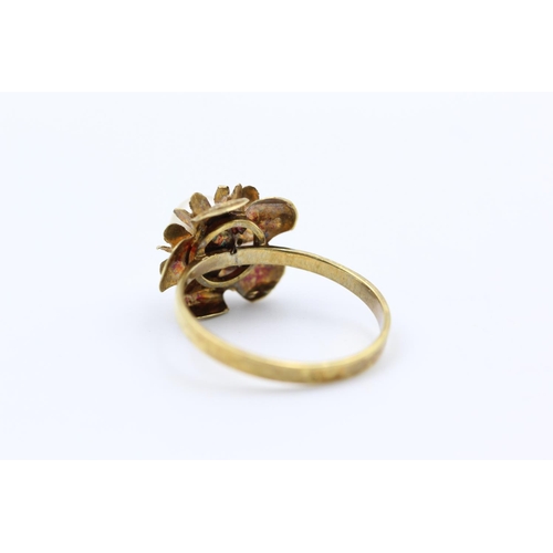 251 - 18ct gold central pearl flower dress ring size P