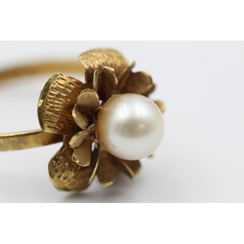 251 - 18ct gold central pearl flower dress ring size P