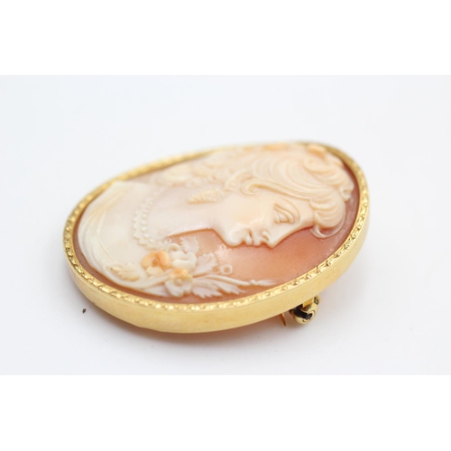 258 - 18ct gold frame shell cameo brooch