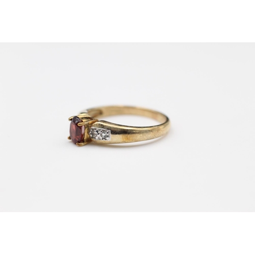 261 - 9ct Gold diamond & garnet detail ring size O