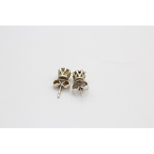 277 - 9ct White gold diamond set stud earrings