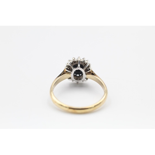 301 - 9ct Gold diamond & sapphire cluster ring size N